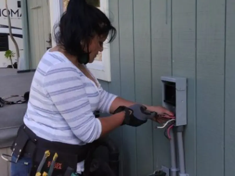 Licensed electrician wiring an exterior subpanel in Wilson's Mills